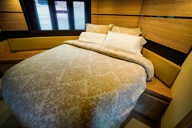  Yacht Photos Pics Luxurious bedroom interior of 2012 Azimut Fly 53 yacht with elegant bedding.