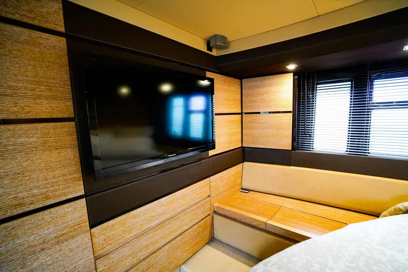  Yacht Photos Pics Luxurious interior of 2012 Azimut Fly 53 yacht with modern TV and seating area.