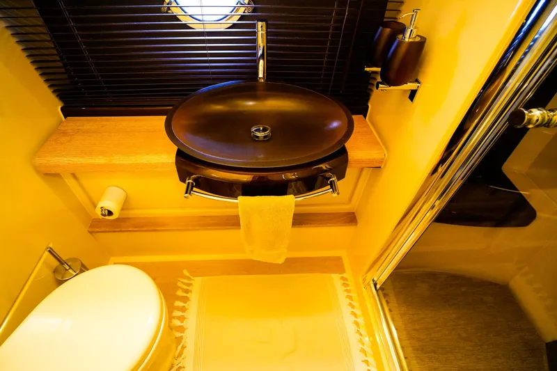 Yacht Photos Pics Luxurious bathroom in 2012 Azimut Fly 53 yacht with modern sink and shower.