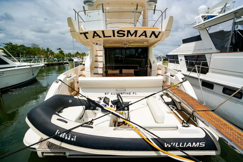  Yacht Photos Pics Azimut Fly 53 yacht, 2012 model, docked with inflatable boat, named "Talisman," in St. Augustine, FL.