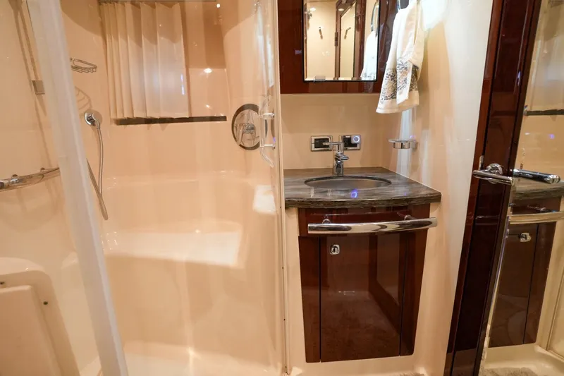 Victoria Yacht Photos Pics Luxurious bathroom in 2013 Sea Ray 610 Sundancer yacht with modern fixtures.