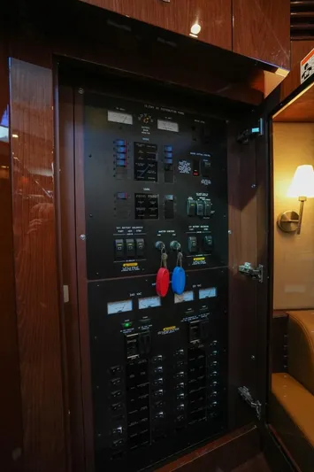 Victoria Yacht Photos Pics Electrical panel inside 2013 Sea Ray 610 Sundancer yacht, featuring switches and controls.