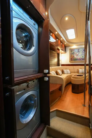 Victoria Yacht Photos Pics 2013 Sea Ray 610 Sundancer interior with washer-dryer and cozy seating area.