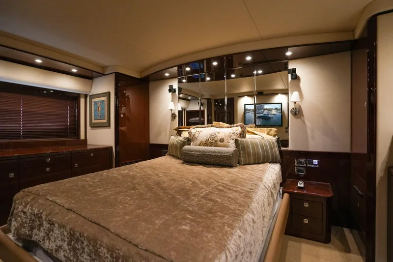 Victoria Yacht Photos Pics Luxurious bedroom interior of 2013 Sea Ray 610 Sundancer yacht with elegant decor.