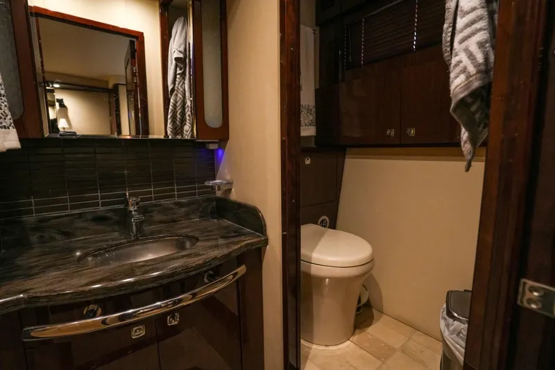 Victoria Yacht Photos Pics Luxurious bathroom interior of 2013 Sea Ray 610 Sundancer yacht.
