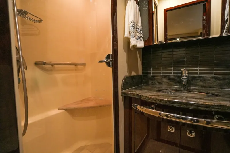 Victoria Yacht Photos Pics Luxurious bathroom in 2013 Sea Ray 610 Sundancer yacht with modern fixtures.