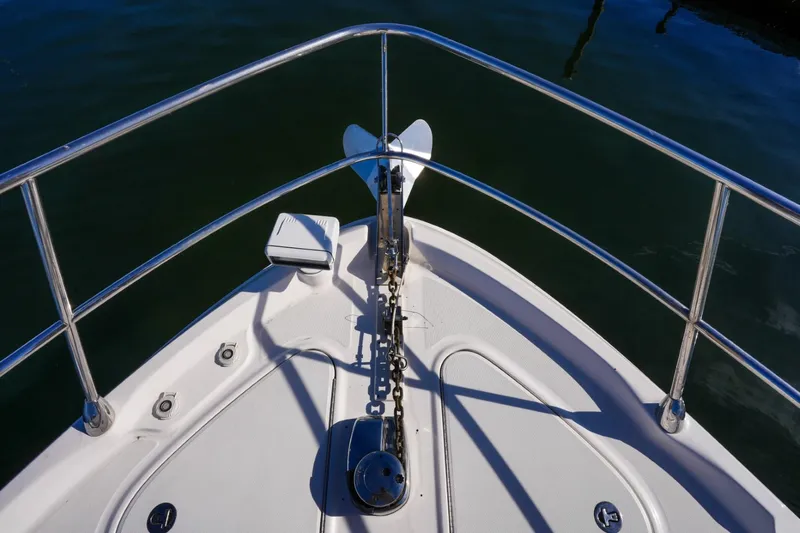 Victoria Yacht Photos Pics Bow of 2013 Sea Ray 610 Sundancer with anchor and railing.