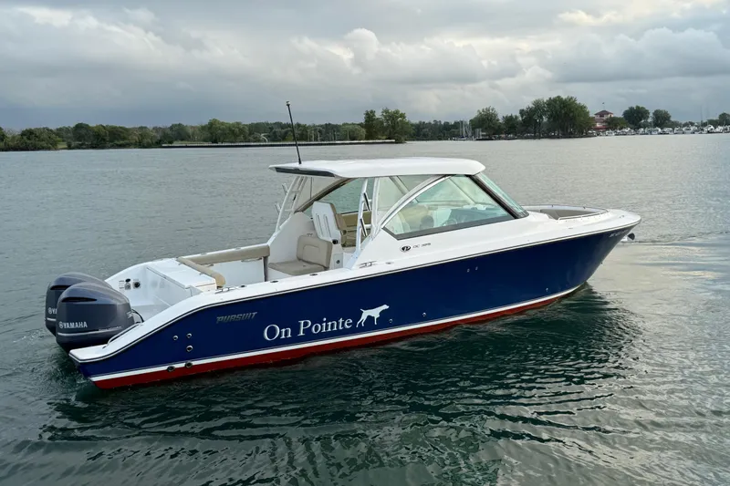 On Pointe Yacht Photos Pics 2016 Pursuit DC 325 Dual Console boat on water, featuring Yamaha engines.