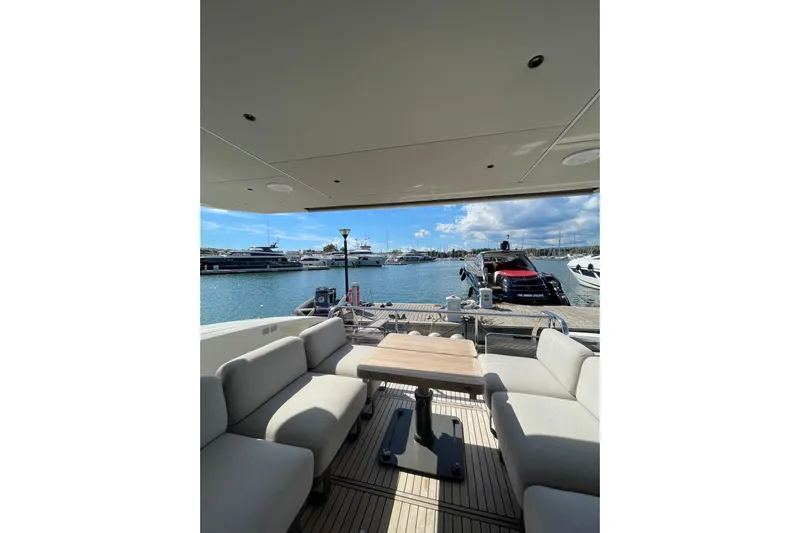  Yacht Photos Pics Luxurious 2023 Absolute 60 Fly yacht interior with marina view.