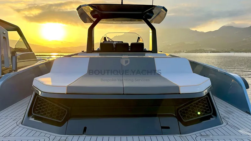 Hull #5 Yacht Photos Pics 2024 Maori 46ft yacht at sunset, featuring sleek design and luxurious seating.