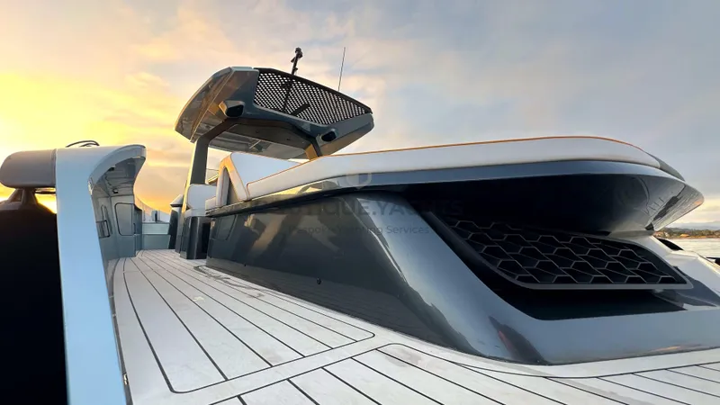 Hull #5 Yacht Photos Pics 2024 Maori 46ft yacht deck at sunset, showcasing sleek design and modern features.