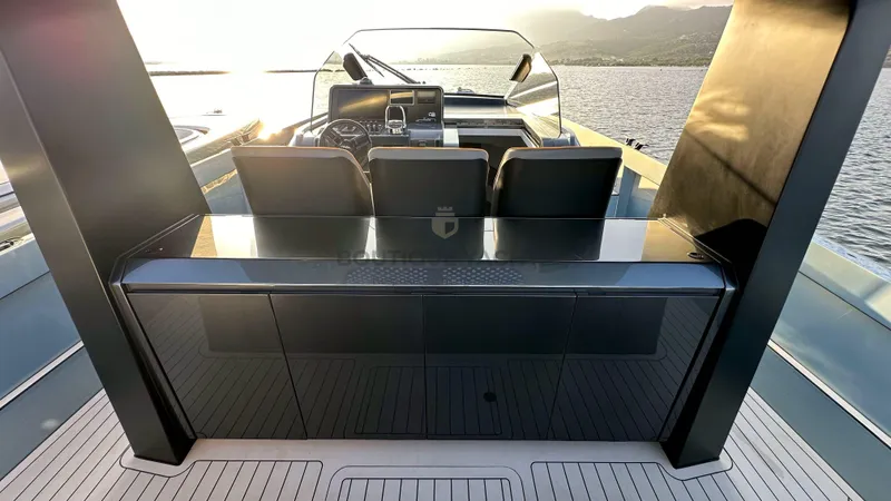 Hull #5 Yacht Photos Pics 2024 Maori 46ft yacht interior with sleek design and modern dashboard, overlooking serene waters.