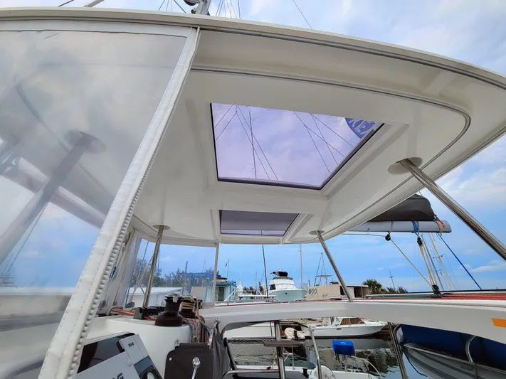 Sugar Magnolia Yacht Photos Pics View from the cockpit of a 2017 Lagoon 42 catamaran in a marina.