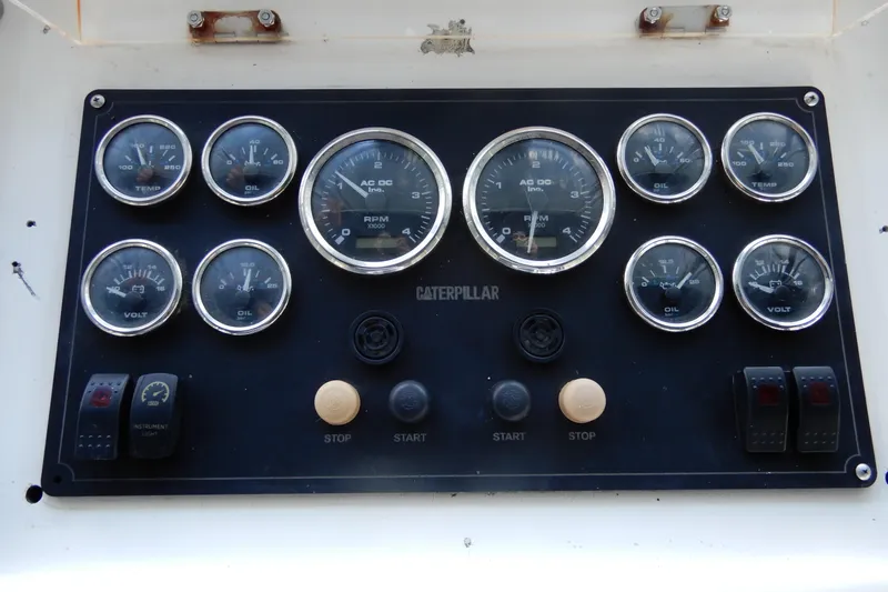  Yacht Photos Pics Dashboard of a 1989 Jefferson 46 Sundeck boat with various gauges and controls.