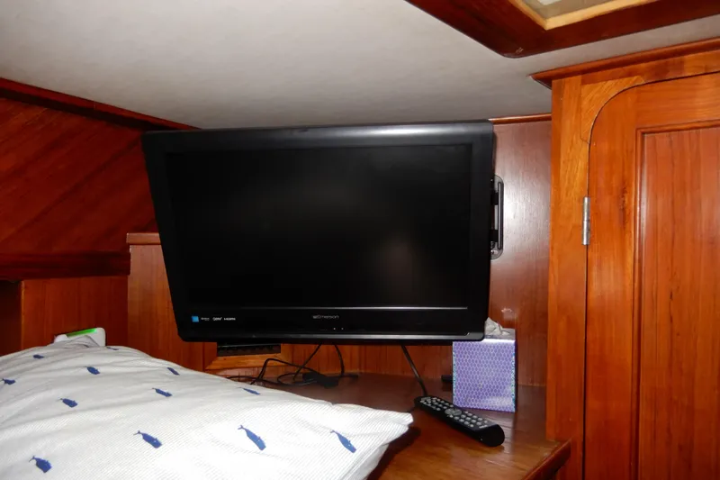 Yacht Photos Pics Flat-screen TV in the cabin of a 1989 Jefferson 46 Sundeck yacht.