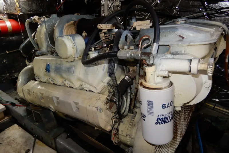  Yacht Photos Pics Engine of a 1989 Jefferson 46 Sundeck boat, featuring detailed mechanical components.