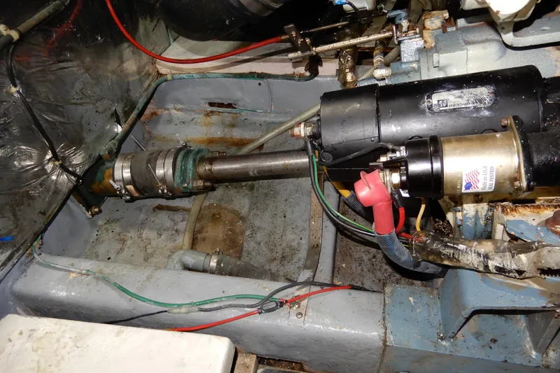  Yacht Photos Pics Engine compartment of 1989 Jefferson 46 Sundeck boat, showing mechanical components and wiring.