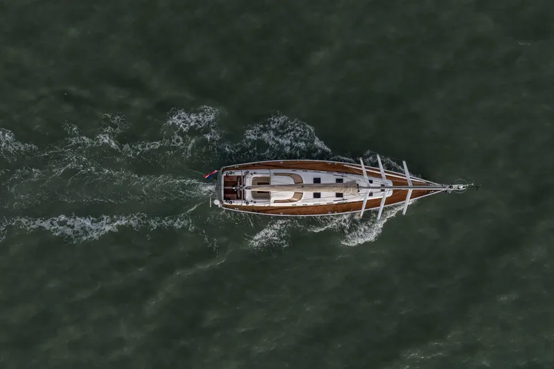 Red Rooster Yacht Photos Pics Aerial view of 2008 Van De Stadt Stadtship 70 sailing on open water.