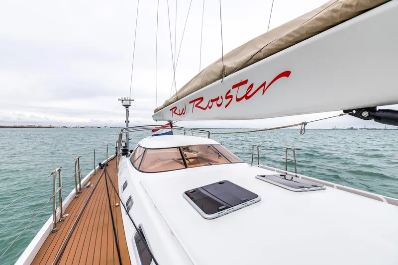 Red Rooster Yacht Photos Pics Sailing yacht Van De Stadt Stadtship 70, 2008, on open water with "Red Rooster" sail.