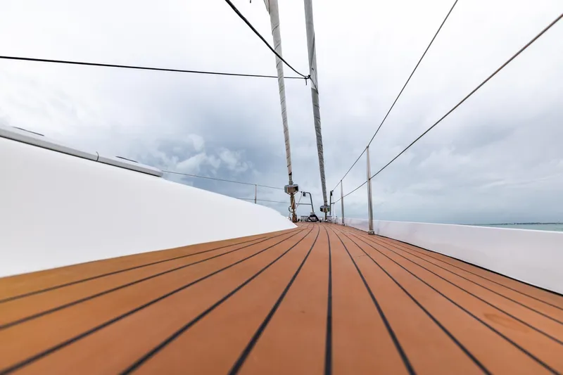 Red Rooster Yacht Photos Pics Deck view of 2008 Van De Stadt Stadtship 70 sailboat under cloudy skies.