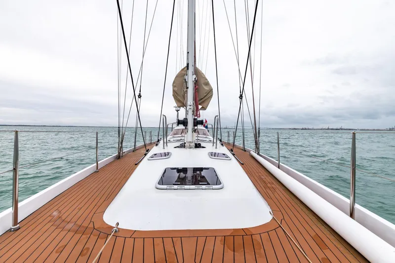Red Rooster Yacht Photos Pics Sailing yacht Van De Stadt Stadtship 70, 2008 model, on open water with teak deck.