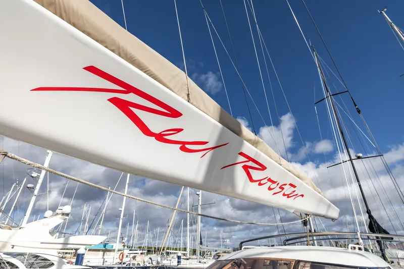 Red Rooster Yacht Photos Pics Sailboat boom with "Red Rooster" text, Van De Stadt Stadtship 70, 2008 model.