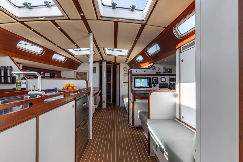 Red Rooster Yacht Photos Pics Luxurious interior of 2008 Van De Stadt Stadtship 70 yacht with modern amenities.