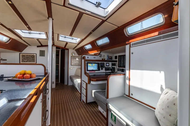 Red Rooster Yacht Photos Pics Luxurious interior of 2008 Van De Stadt Stadtship 70 yacht with modern navigation equipment.