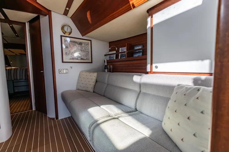 Red Rooster Yacht Photos Pics Luxurious interior of 2008 Van De Stadt Stadtship 70 yacht with elegant seating and decor.