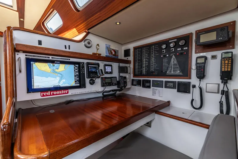 Red Rooster Yacht Photos Pics Navigation station of 2008 Van De Stadt Stadtship 70 yacht with advanced equipment.
