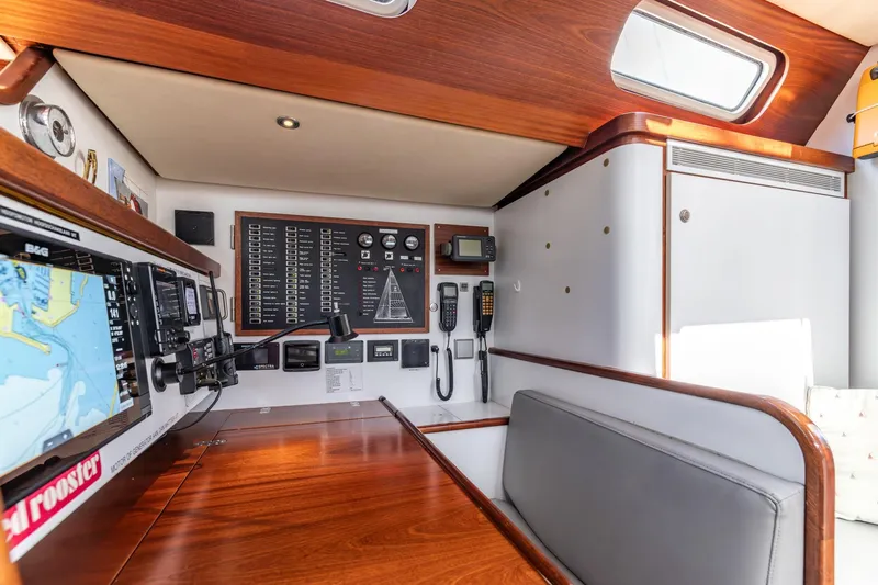 Red Rooster Yacht Photos Pics Navigation station of 2008 Van De Stadt Stadtship 70 yacht with control panels and equipment.