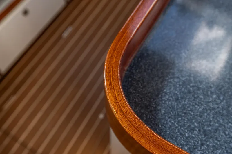 Red Rooster Yacht Photos Pics Polished wood and granite detail on 2008 Van De Stadt Stadtship 70 yacht interior.