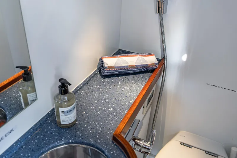 Red Rooster Yacht Photos Pics Luxurious bathroom in 2008 Van De Stadt Stadtship 70 yacht with modern fixtures and elegant countertop.