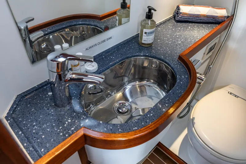 Red Rooster Yacht Photos Pics Luxurious yacht bathroom with modern sink and toilet, Van De Stadt Stadtship 70, 2008.