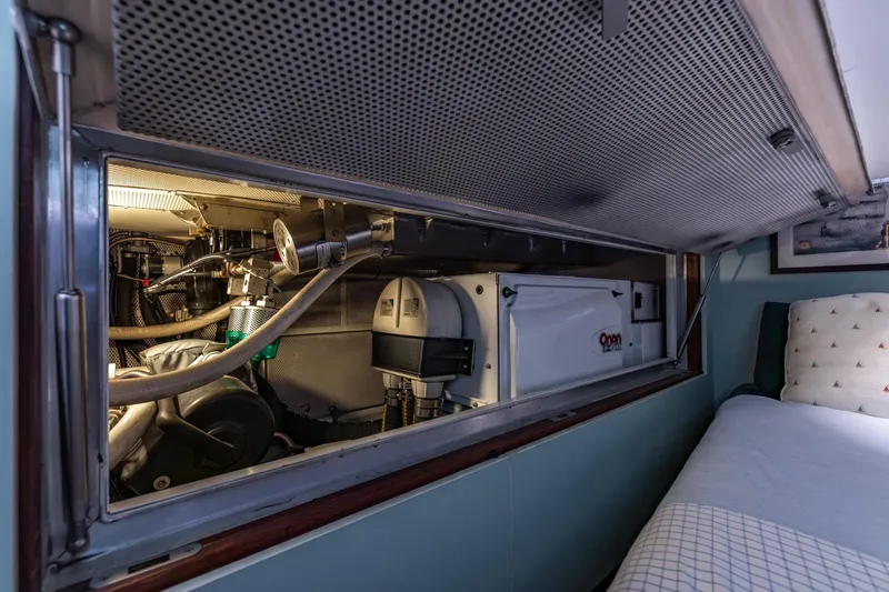 Red Rooster Yacht Photos Pics Engine room of 2008 Van De Stadt Stadtship 70 yacht, featuring Onan generator.