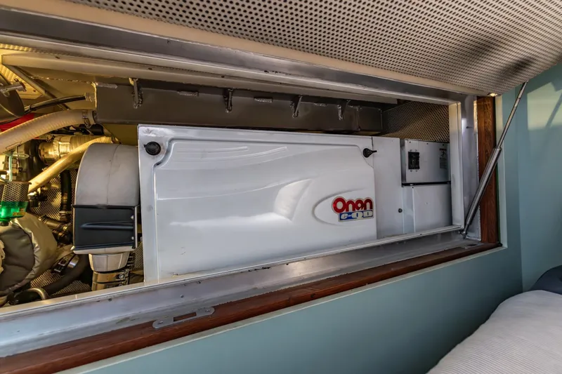 Red Rooster Yacht Photos Pics Onan generator in 2008 Van De Stadt Stadtship 70 engine compartment.