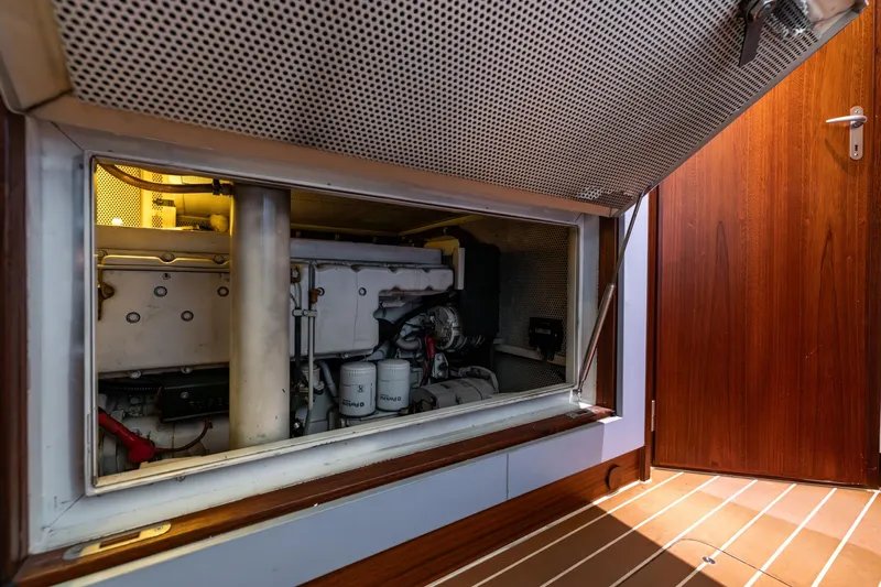 Red Rooster Yacht Photos Pics Engine room of 2008 Van De Stadt Stadtship 70 yacht, featuring mechanical components.