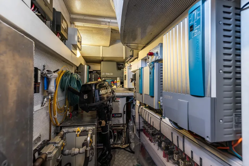 Red Rooster Yacht Photos Pics Engine room of 2008 Van De Stadt Stadtship 70 with equipment and wiring.