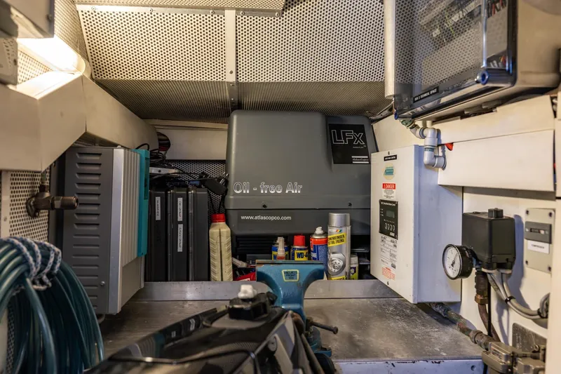 Red Rooster Yacht Photos Pics Engine room of 2008 Van De Stadt Stadtship 70 with equipment and tools.