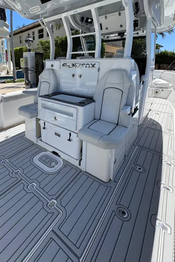 Seakeeper And Joystick Yacht Photos Pics 2020 Sea Fox 368 Commander boat interior with seating and storage.