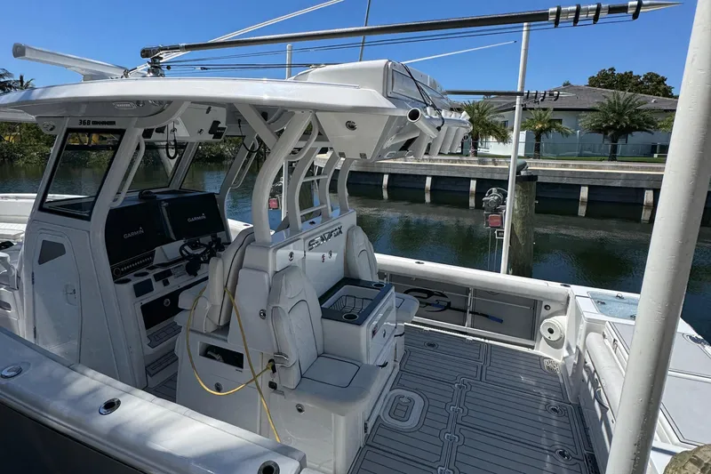 Seakeeper And Joystick Yacht Photos Pics 2020 Sea Fox 368 Commander boat interior with advanced navigation systems and seating.