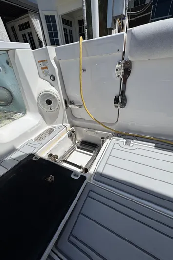 Seakeeper And Joystick Yacht Photos Pics 2020 Sea Fox 368 Commander boat deck with storage compartments and speaker.