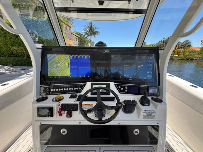 Seakeeper And Joystick Yacht Photos Pics 2020 Sea Fox 368 Commander helm with advanced navigation displays and controls.