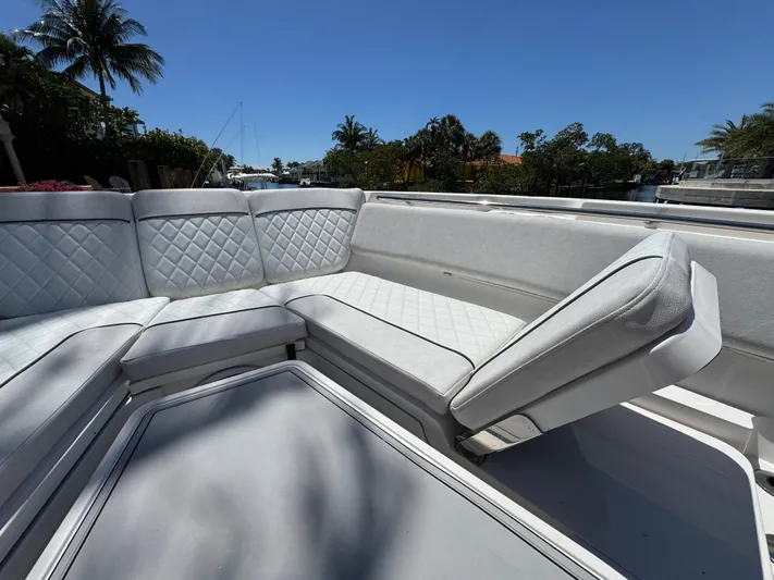 Seakeeper And Joystick Yacht Photos Pics 2020 Sea Fox 368 Commander boat with luxurious white seating and quilted upholstery.
