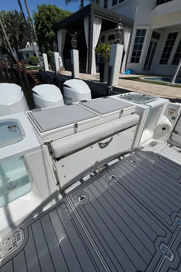 Seakeeper And Joystick Yacht Photos Pics 2020 Sea Fox 368 Commander boat deck with storage and seating area.