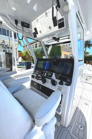 Seakeeper And Joystick Yacht Photos Pics 2020 Sea Fox 368 Commander boat cockpit with advanced navigation system and luxurious seating.