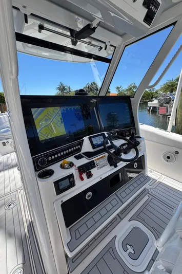 Seakeeper And Joystick Yacht Photos Pics 2020 Sea Fox 368 Commander helm with dual displays and modern controls.