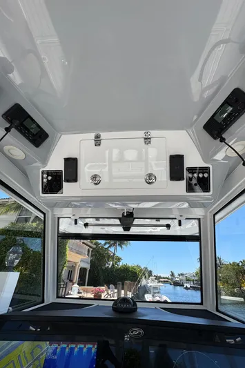 Seakeeper And Joystick Yacht Photos Pics Interior view of 2020 Sea Fox 368 Commander boat cockpit with navigation equipment.