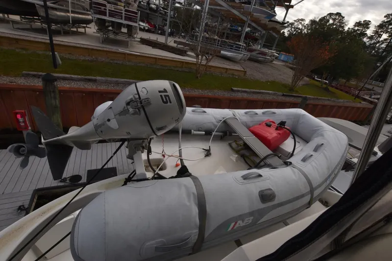 E2rt Yacht Photos Pics Inflatable boat with outboard motor on 2006 Carver 46 Voyager yacht deck.