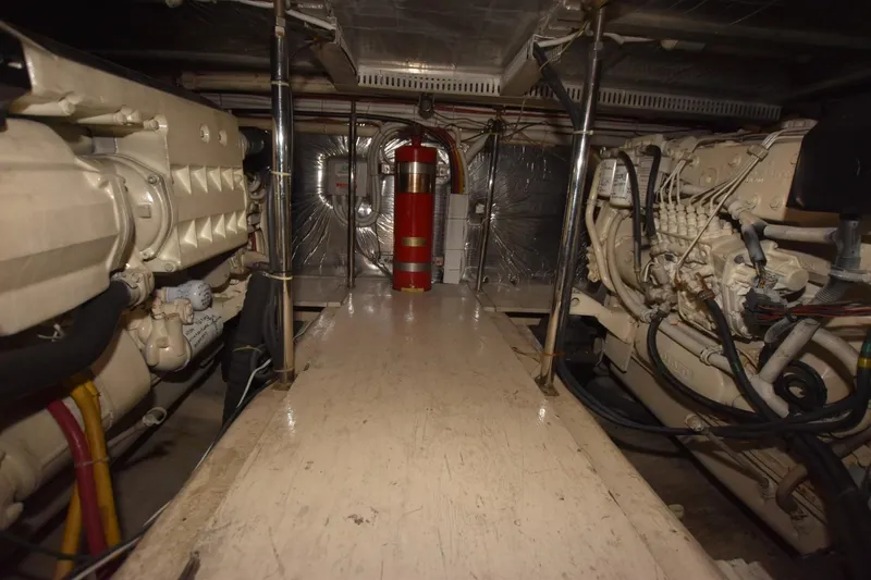 E2rt Yacht Photos Pics Engine room of 2006 Carver 46 Voyager yacht, showcasing mechanical components and systems.